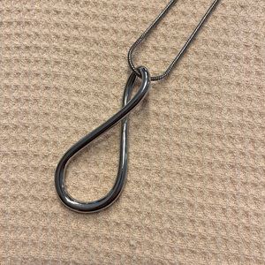 32 in silver colored necklace